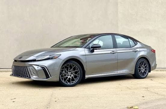 Toyota Camry Premium Sedan · 2025/2026 - 4 passengers, 3 luggage capacity. Our most requested car, and the one most pilgrims travel in. Quiet, economical and cooled well before you step in — the sensible choice for airport runs and city transfers.