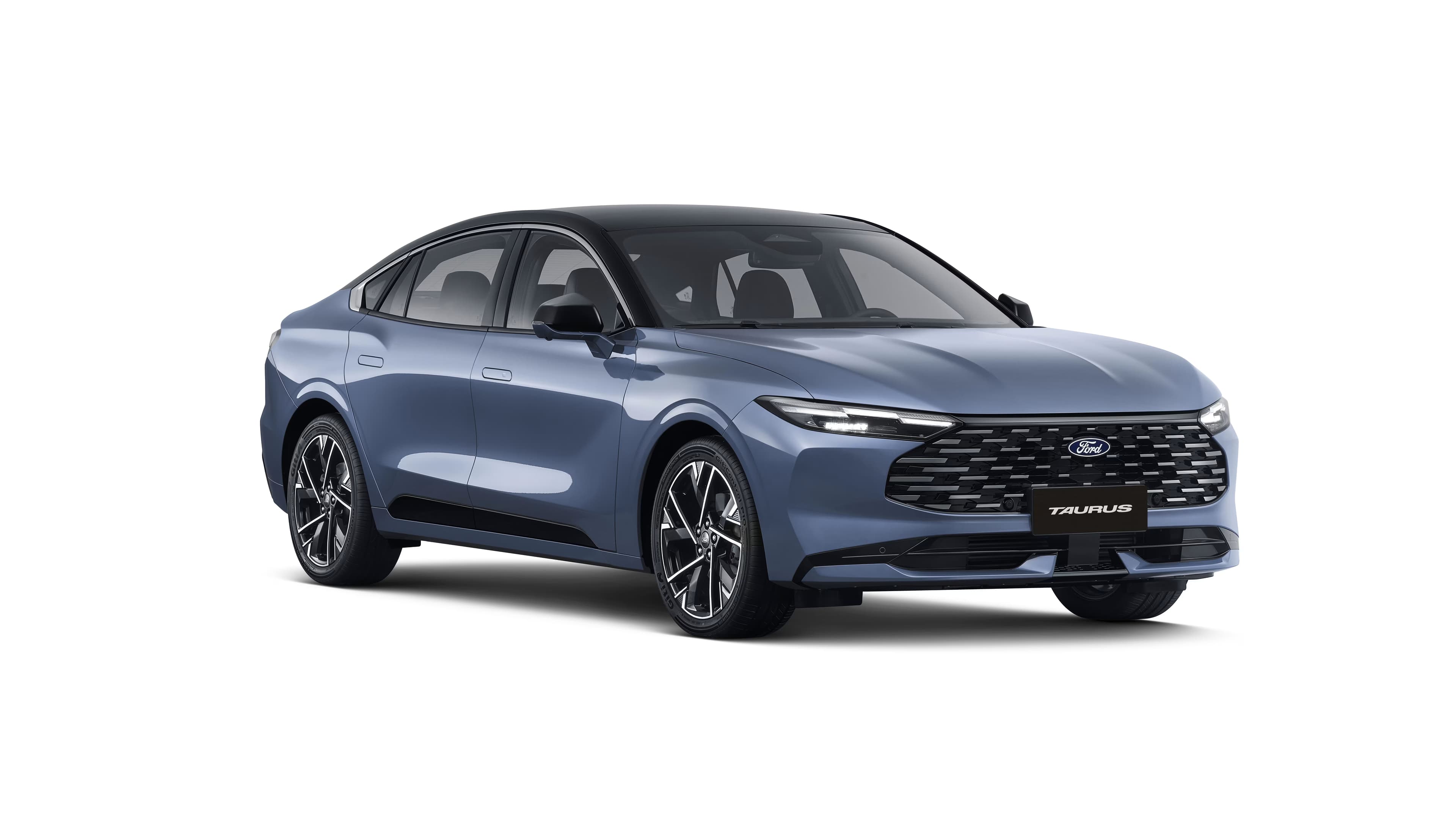 Ford Taurus Full-Size Sedan · 2025/2026 - 4 passengers, 4 luggage capacity. A larger sedan with a deep boot, so four travellers and full Umrah luggage fit without splitting across two cars.